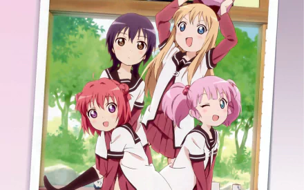 YuruYuri anime HD PC desktop wallpaper showing four schoolgirls in sailor uniforms — two pink-haired, one blonde, one dark-haired — posing cheerfully at an open window with trees.