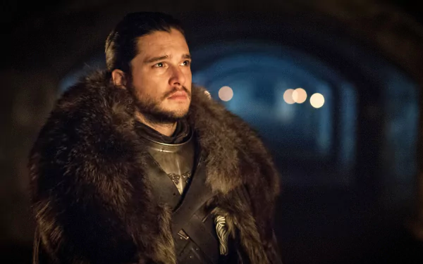 4K Ultra HD PC desktop wallpaper featuring Kit Harington as Jon Snow from the TV show Game of Thrones, dressed in dark fur and armor in a dimly lit setting.