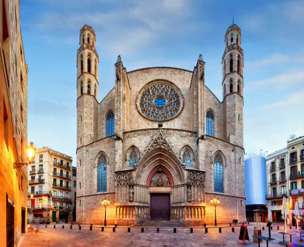 4K Ultra HD image of Santa Maria del Mar cathedral in Barcelona, Spain, showcasing its gothic architecture and religious significance against a clear sky backdrop.