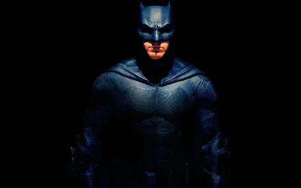 HD desktop wallpaper featuring Ben Affleck as Batman from the movie Justice League (2017), standing in a dark, shadowy background.