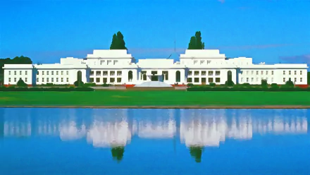 Artistic HD wallpaper of Australia's Parliament building in Canberra, captured with a clear reflection on the water under a bright blue sky.