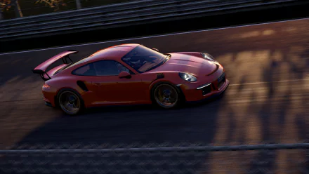 Red Porsche 911 racing on a track in the video game Project Cars 2, rendered in 4K Ultra HD for a PC desktop wallpaper and background.