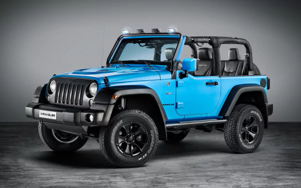 A vibrant blue Jeep Wrangler Rubicon with an open roof displayed against a dark gradient background in a 4K Ultra HD PC desktop wallpaper.