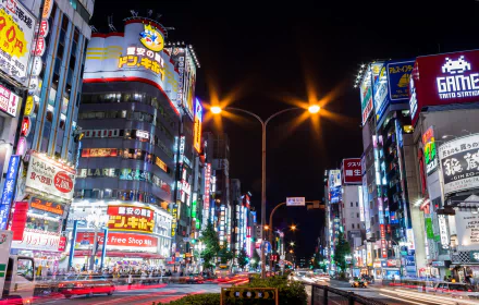 HD wallpaper of Shinjuku, Tokyo, featuring the vibrant night lights and bustling streets of the city.