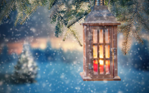 A man-made lantern glows warmly, hanging from snow-covered pine branches with snowfall softly blurring the background, captured in 4K Ultra HD with striking depth of field.