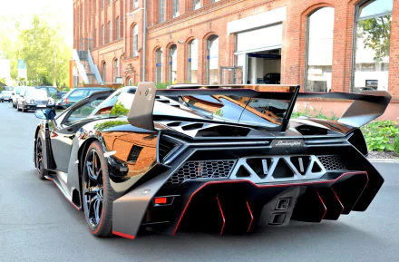 Sleek black Lamborghini Veneno Roadster supercar parked on a street, showcased in an HD PC desktop wallpaper background.