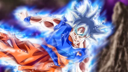 HD desktop wallpaper of Goku from Dragon Ball Super, showcasing him in a powerful stance with flowing blue aura, highlighting his dynamic and intense energy. Vibrant and action-packed anime art.