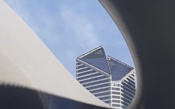 4K Ultra HD PC desktop wallpaper featuring a modern architectural view inspired by the video game Watch Dogs, highlighting geometric building shapes against a clear sky.