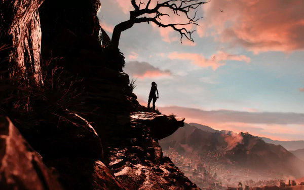 Lara Croft silhouette on a jagged cliff at sunset, overlooking misty mountains — Rise of the Tomb Raider video game 2K Quad HD PC wallpaper.