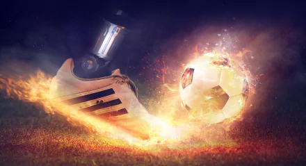 A dynamic 4K Ultra HD wallpaper showing a flaming soccer ball and a shoe in motion, with fiery effects enhancing the intense sports photography manipulation.