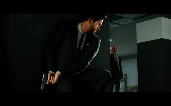 HD Past Cure game wallpaper featuring a crouched man with a gun in a sleek suit, ready for action in a modern, dimly lit environment.