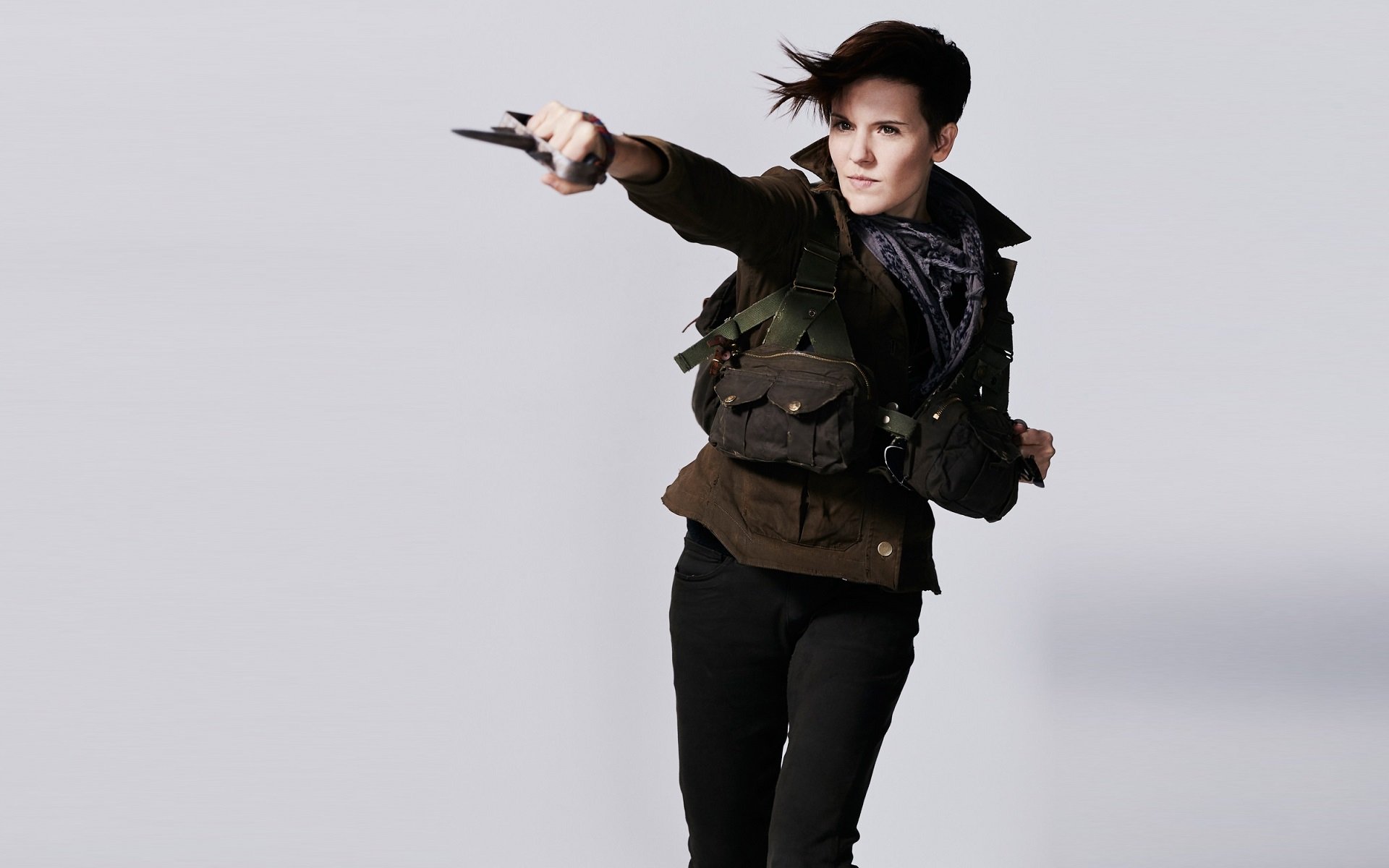 HD desktop wallpaper: woman in tactical gear lunging with a knife, TV show themed — Fear the Walking Dead.