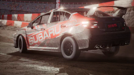 HD desktop wallpaper of a Subaru rally car on gravel with dynamic lighting.