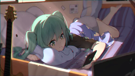 HD PC desktop wallpaper featuring Hatsune Miku from Vocaloid in anime style, lying on a bed and holding a smartphone with a cozy, softly lit room background.
