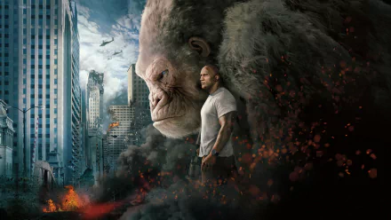 HD desktop wallpaper from the movie Rampage (2018) featuring Dwayne Johnson with a large ape, set against a cityscape background with destruction and helicopters.