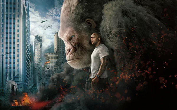 HD desktop wallpaper from the movie Rampage (2018) featuring Dwayne Johnson with a large ape, set against a cityscape background with destruction and helicopters.