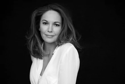 HD wallpaper featuring a monochrome portrait of a woman in a white shirt against a black background.