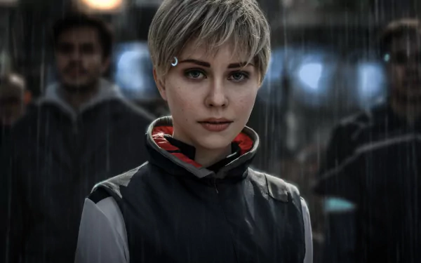 HD PC desktop wallpaper featuring a woman cosplaying Kara from Detroit: Become Human, set in a rainy urban environment with blurred figures in the background.