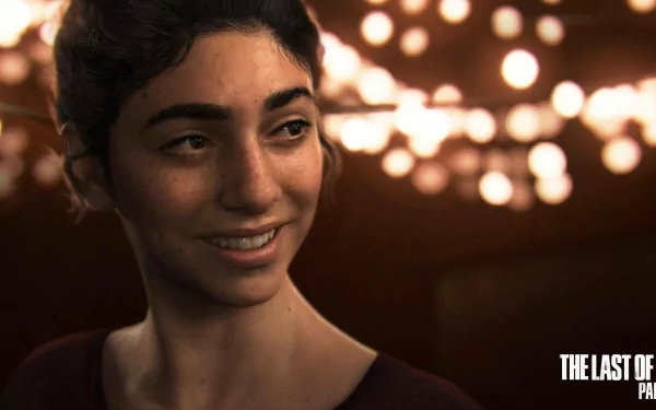 HD PC desktop wallpaper featuring Dina from the video game The Last of Us Part II, showcasing detailed character art with warm lighting and a soft smile.