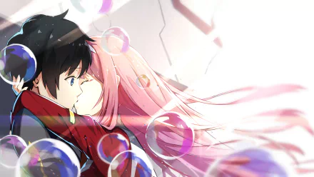 HD desktop wallpaper featuring Hiro and Zero Two from the anime Darling in the FranXX. The colorful image captures an emotional moment between the characters, with bubbles adding a whimsical touch.