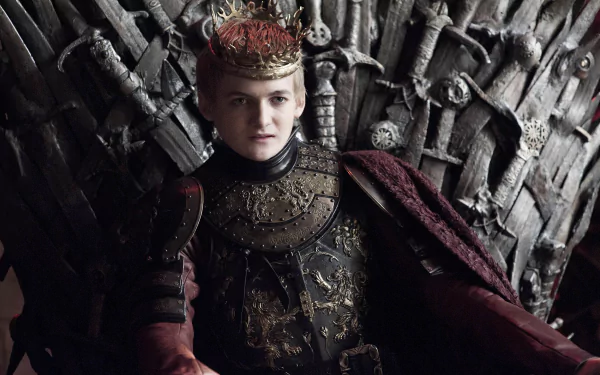 Joffrey Baratheon in ornate crown and armor seated on the Iron Throne — Game of Thrones HD PC desktop wallpaper.