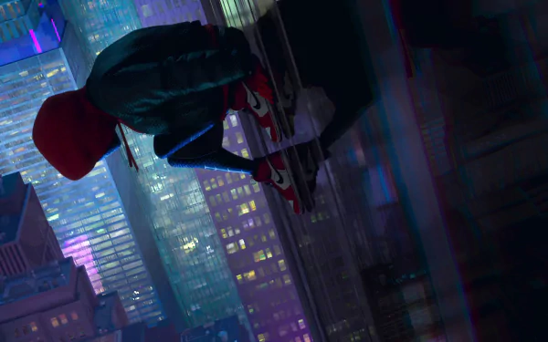 HD wallpaper from the movie Spider-Man: Into The Spider-Verse, featuring Spider-Man overlooking a neon-lit cityscape at night.