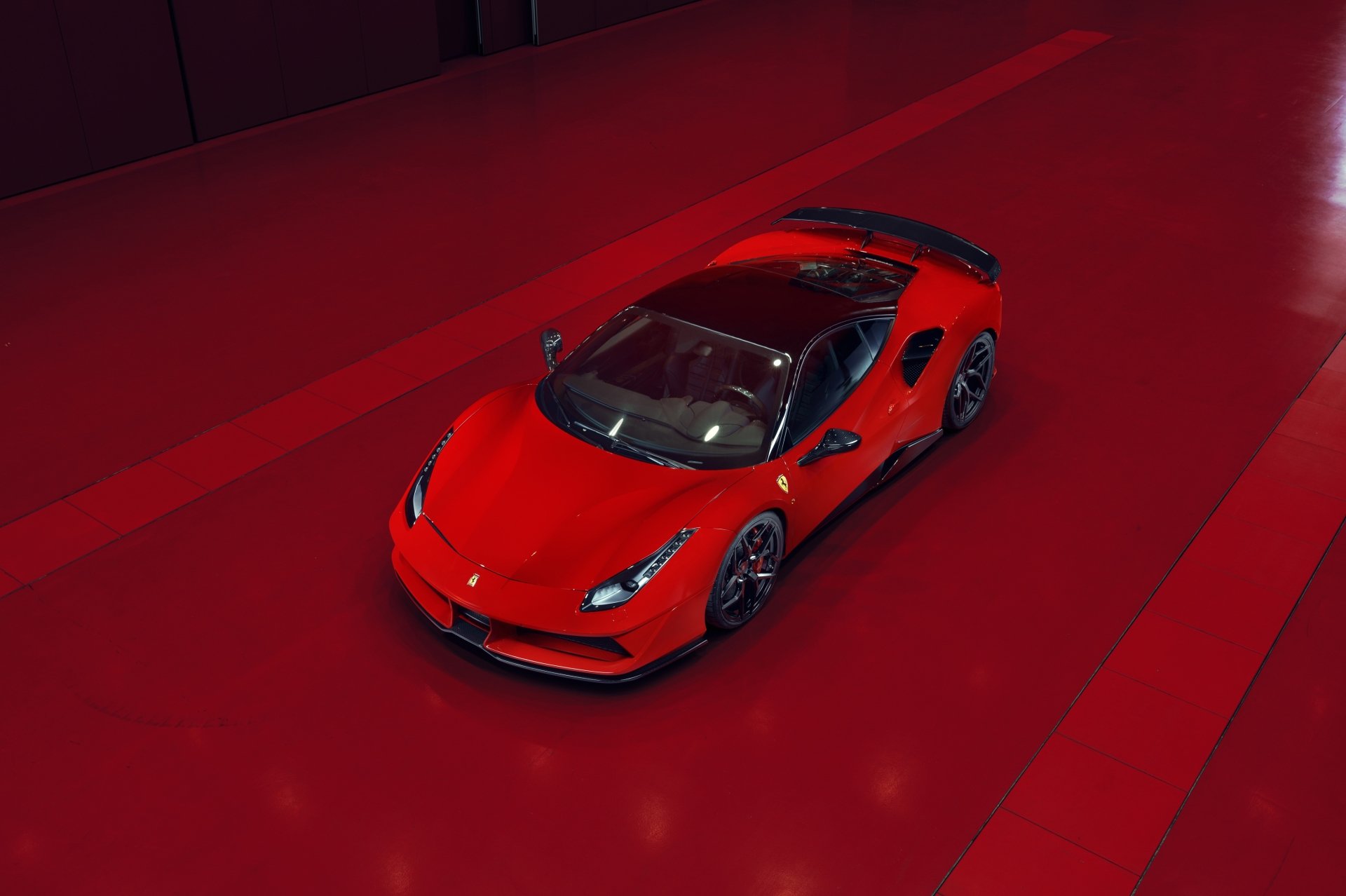 Top-down view of a red Ferrari 488 supercar on a glossy red backdrop — high-detail 4K Ultra HD PC desktop wallpaper showcasing the sports car vehicle.