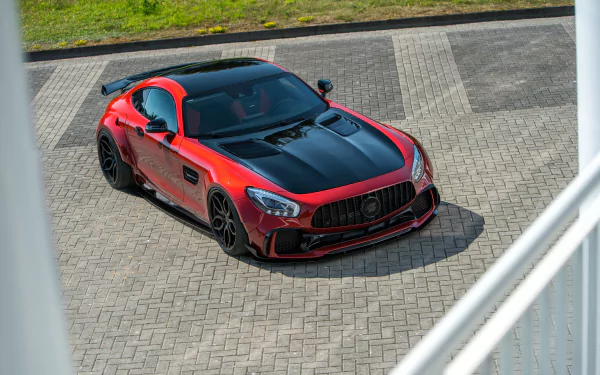 A red and black Mercedes-AMG GT S supercar parked on a paved surface, captured in 4K Ultra HD for a PC desktop wallpaper.