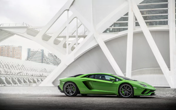 A vibrant green Lamborghini Aventador S supercar parked in front of a modern architectural structure, captured in 4K Ultra HD as a stunning PC desktop wallpaper.