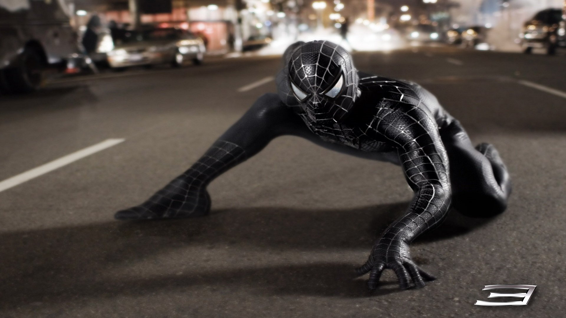 HD PC desktop wallpaper from the movie Spider-Man 3: black-suited Spider-Man crouched on a wet city street at night, symbiote suit glossy and reflective.