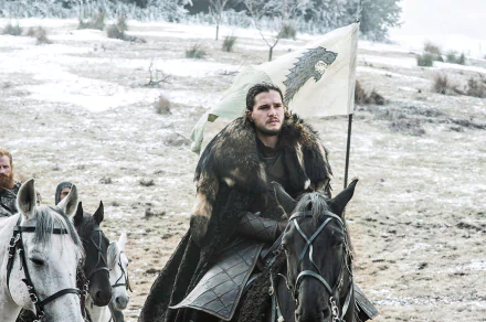 Man in a fur cloak on horseback in a snowy field, holding a banner — Game of Thrones TV show HD desktop wallpaper.