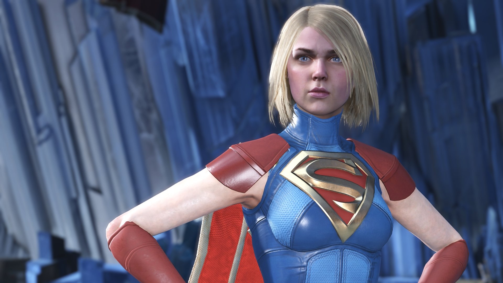 Supergirl from Injustice 2 in armored blue-and-red suit, hands on hips before a crystalline backdrop — 4K Ultra HD PC video game desktop wallpaper.