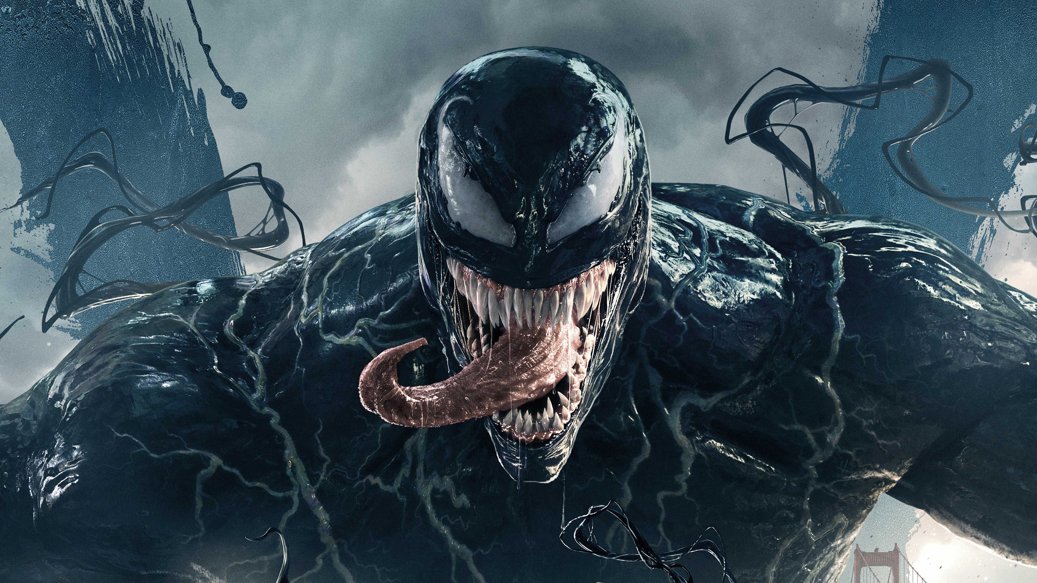 HD desktop wallpaper of Venom, featuring the character in a menacing pose with dynamic, swirling tendrils and a detailed textured suit.