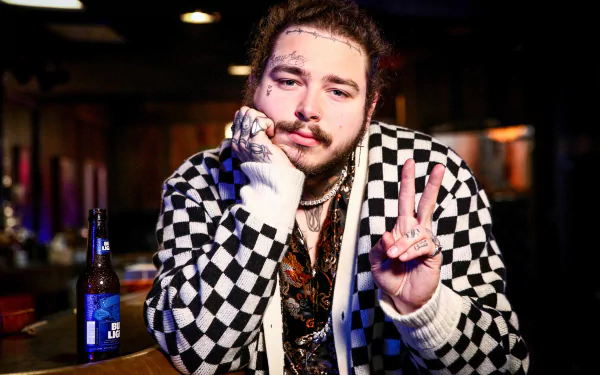 HD desktop wallpaper of a person posing with a peace sign, featuring facial tattoos and a checkered jacket.