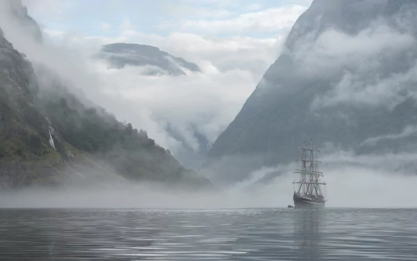 A majestic ship sails through misty waters surrounded by towering Norwegian mountains in this 4K Ultra HD desktop wallpaper.