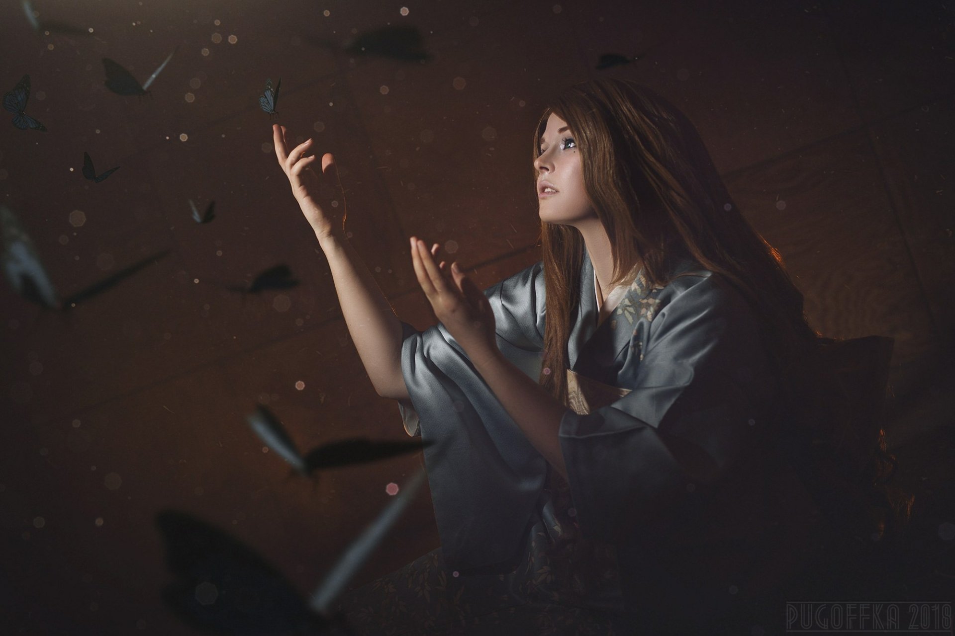 HD PC desktop wallpaper: a woman in xxxHOLiC cosplay reaches toward drifting butterflies against a moody, dark background.
