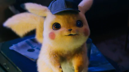 HD desktop wallpaper featuring Detective Pikachu from the Pokémon movie, Pokémon Detective Pikachu, wearing a hat.
