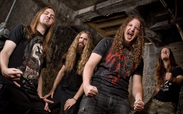 HD wallpaper of the band Lazarus A.D., featuring the members posing with enthusiasm in a gritty, industrial setting.