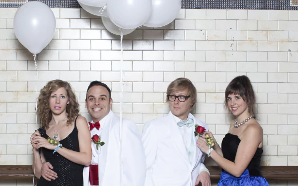 HD desktop wallpaper of Lake Street Dive with band members posing in formal attire against a white tiled wall with balloons.