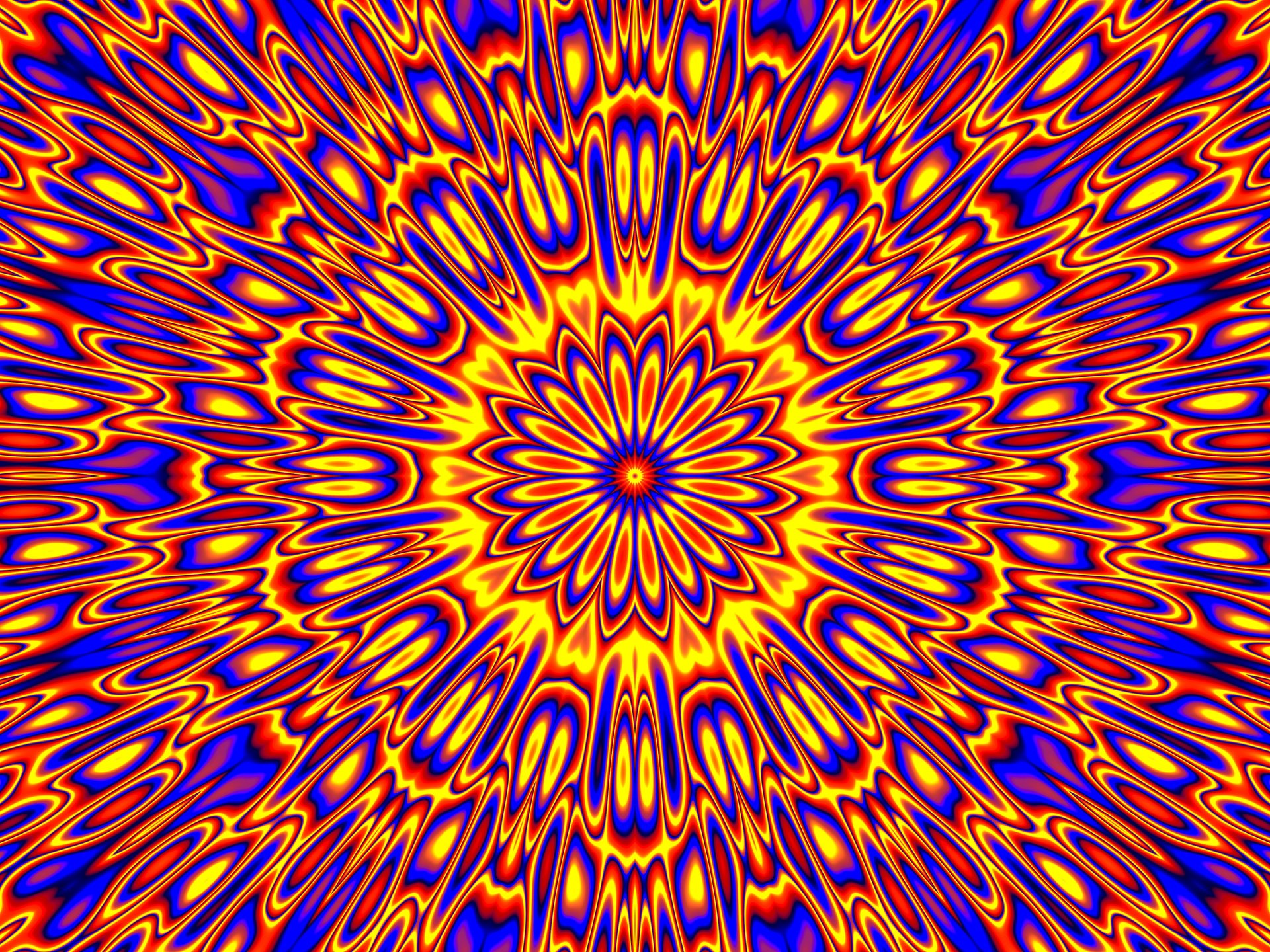 Colorful abstract kaleidoscope with radiating orange, yellow, red and blue waves forming a floral star — vivid 4K Ultra HD PC desktop wallpaper background.