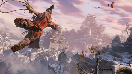 HD desktop wallpaper featuring a dynamic scene from the video game Sekiro: Shadows Die Twice, showcasing a character leaping through a snowy, temple-filled landscape under a pink-hued sky.