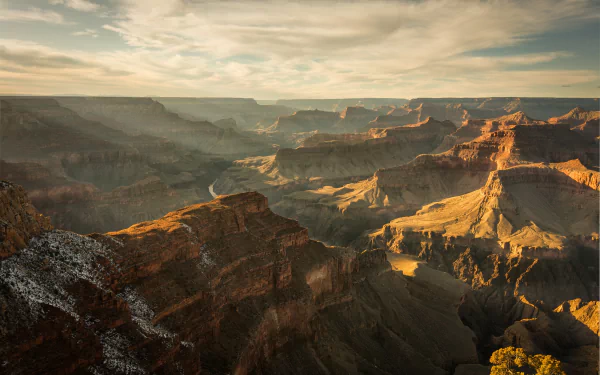Sunrise over the Grand Canyon in Arizona, showcasing the vast landscape and natural beauty of this iconic USA national park in stunning HD quality.