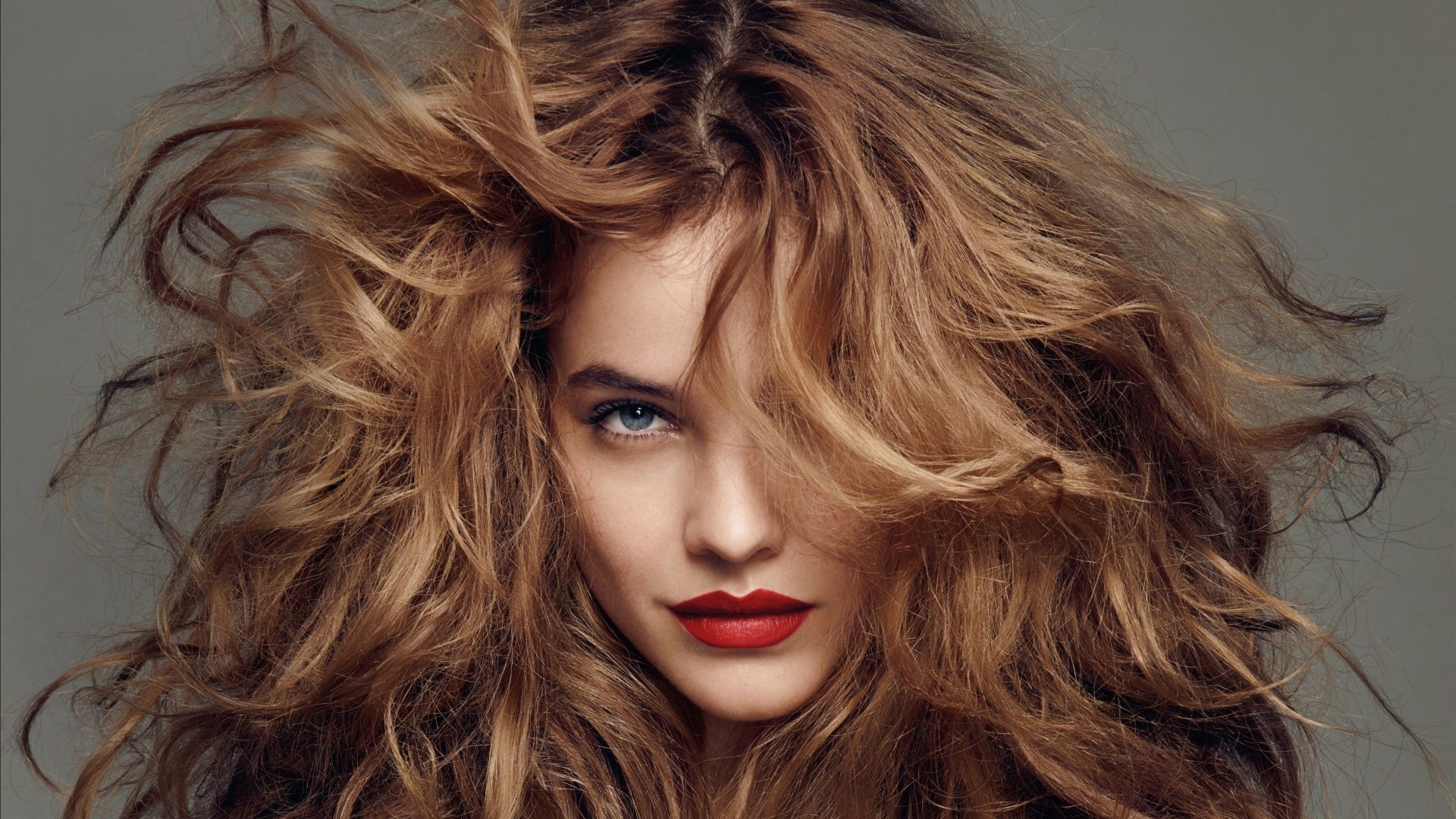 Close-up portrait of celebrity Barbara Palvin with voluminous hair and bold red lipstick, captured in 4K Ultra HD for a PC desktop wallpaper.